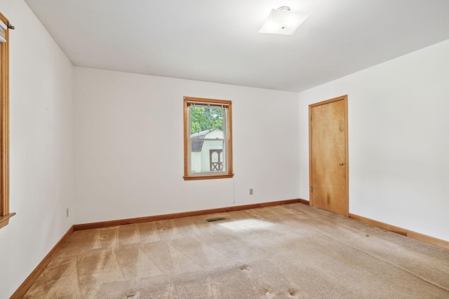 909 Hillsboro Rd, Franklin, TN 37064 - carpeted empty room with baseboards and visible vents