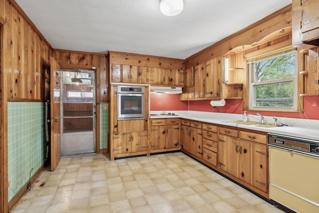 909 Hillsboro Rd, Franklin, TN 37064 - kitchen with a sink, dishwasher, stainless steel oven, light floors, and light countertops