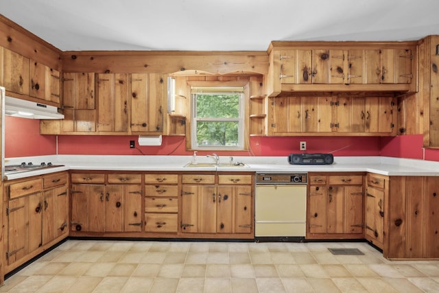 909 Hillsboro Rd, Franklin, TN 37064 - kitchen featuring light countertops, brown cabinets, under cabinet range hood, and a sink
