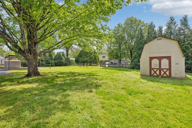 909 Hillsboro Rd, Franklin, TN 37064 - view of yard with fence, an outbuilding, and a shed