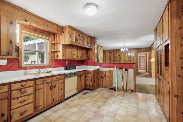 909 Hillsboro Rd, Franklin, TN 37064 - kitchen featuring brown cabinetry, dishwasher, light floors, an inviting chandelier, and light countertops