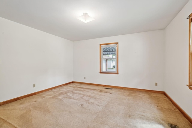 909 Hillsboro Rd, Franklin, TN 37064 - carpeted spare room featuring baseboards and visible vents