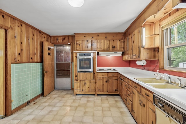 909 Hillsboro Rd, Franklin, TN 37064 - kitchen featuring a sink, stainless steel oven, white dishwasher, light floors, and under cabinet range hood