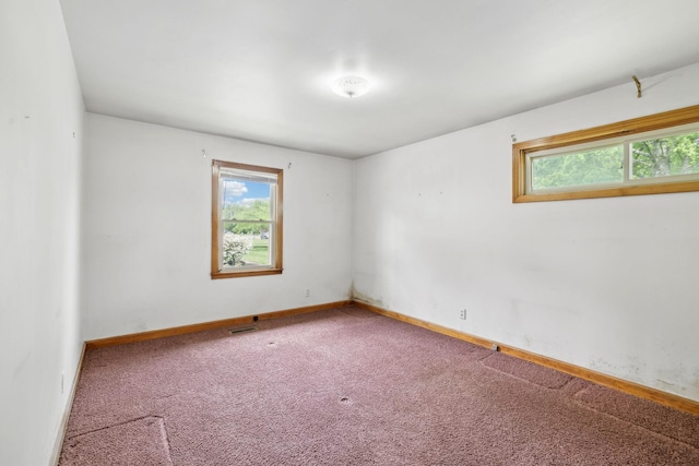 909 Hillsboro Rd, Franklin, TN 37064 - spare room featuring plenty of natural light, visible vents, and carpet flooring