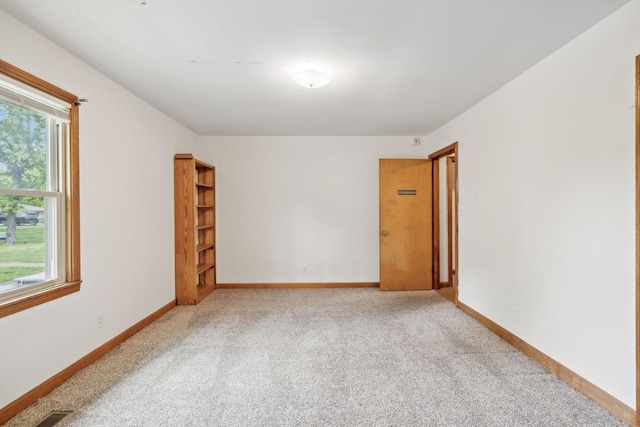 909 Hillsboro Rd, Franklin, TN 37064 - carpeted spare room with baseboards