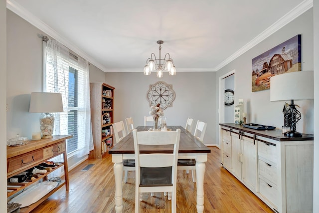1803 W Lori Lee Dr, Gallatin, TN 37066 - dining area with light wood-style floors, visible vents, crown molding, and a notable chandelier