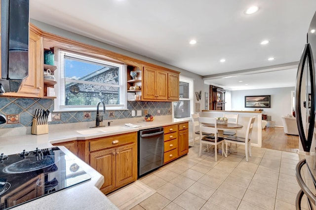 1803 W Lori Lee Dr, Gallatin, TN 37066 - kitchen with open shelves, light countertops, a sink, decorative backsplash, and black appliances