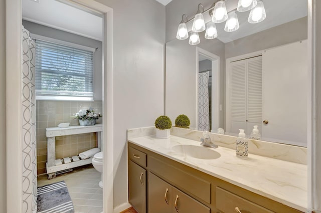 1803 W Lori Lee Dr, Gallatin, TN 37066 - bathroom with tile patterned flooring, a closet, toilet, and vanity