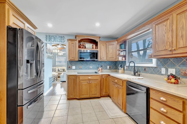 1803 W Lori Lee Dr, Gallatin, TN 37066 - kitchen featuring stainless steel appliances, open shelves, light countertops, light tile patterned floors, and a sink