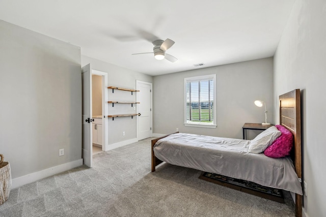 bedroom with carpet floors, baseboards, and a ceiling fan