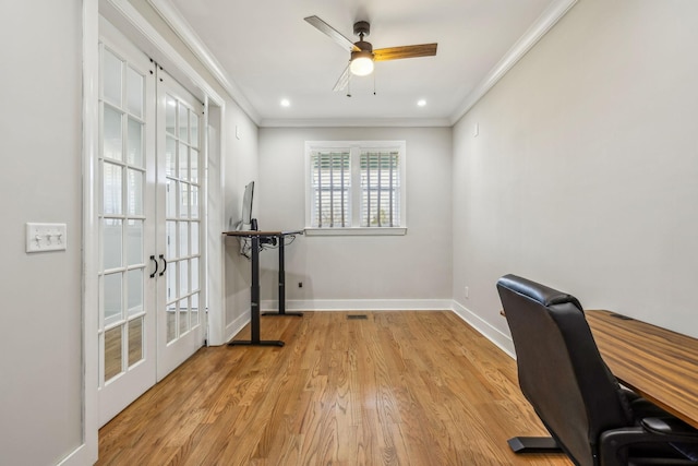 office space featuring crown molding, french doors, a ceiling fan, baseboards, and light wood-style floors