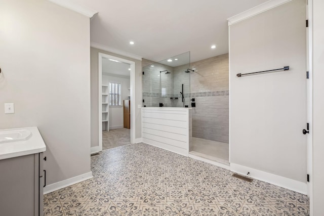 full bath with baseboards, a walk in shower, vanity, ornamental molding, and recessed lighting