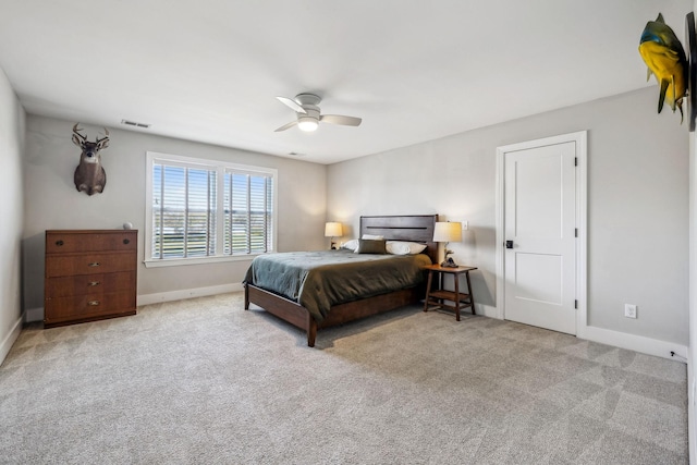 bedroom featuring baseboards, carpet, and a ceiling fan