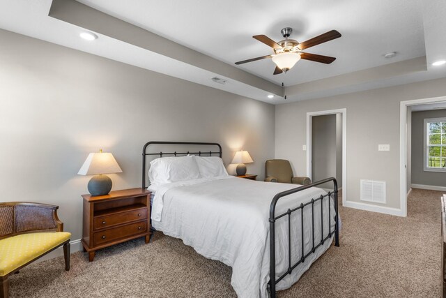 bedroom featuring recessed lighting, light carpet, visible vents, and baseboards