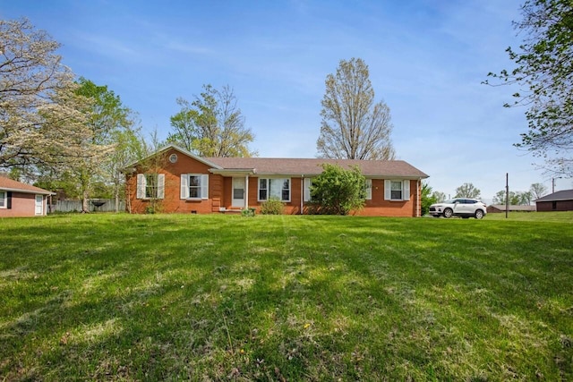 ranch-style home featuring a front yard