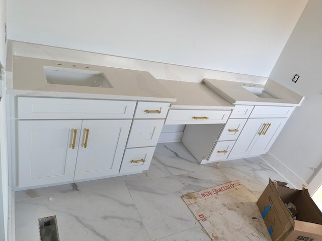 bathroom featuring vanity and marble finish floor