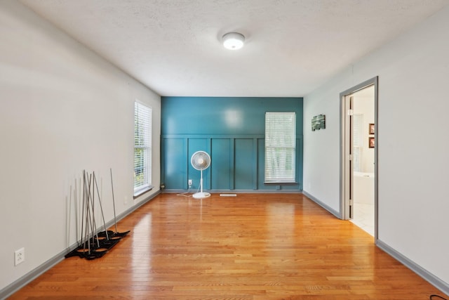 4726 Hickory Ln, Murfreesboro, TN 37129 - spare room with light wood-type flooring and a decorative wall