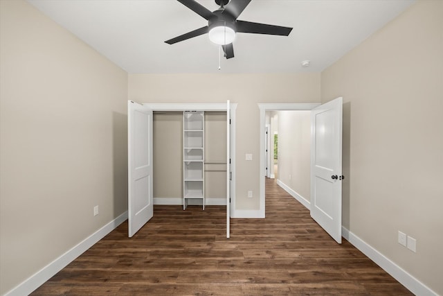 305 Georgee Rd, Jamestown, TN 38556 - unfurnished bedroom with dark wood-style flooring, a closet, and baseboards