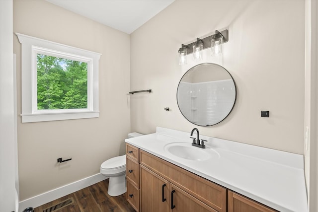 305 Georgee Rd, Jamestown, TN 38556 - bathroom featuring toilet, baseboards, wood finished floors, and vanity
