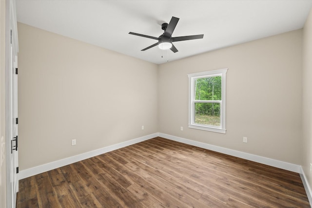 305 Georgee Rd, Jamestown, TN 38556 - empty room with baseboards, dark wood-style floors, and a ceiling fan
