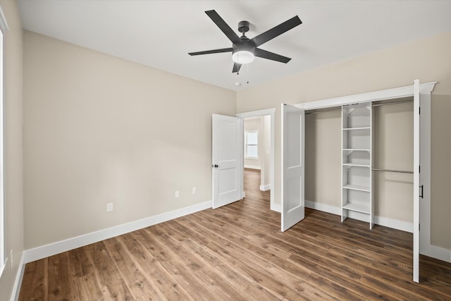 305 Georgee Rd, Jamestown, TN 38556 - unfurnished bedroom with wood finished floors, baseboards, a closet, and ceiling fan