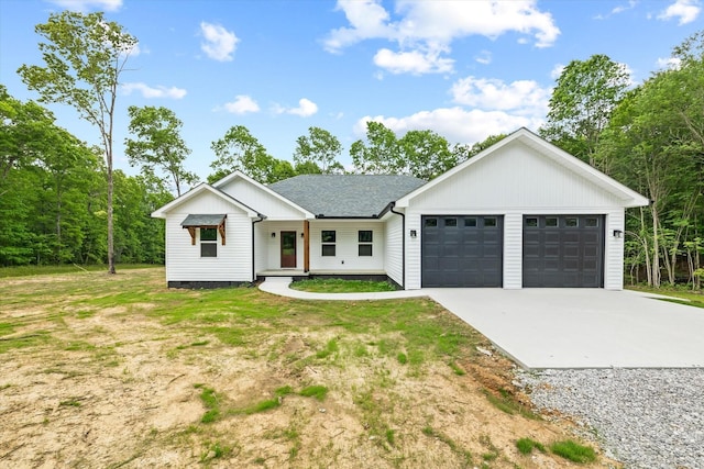 305 Georgee Rd, Jamestown, TN 38556 - view of front of house featuring driveway, an attached garage, a front lawn, and roof with shingles