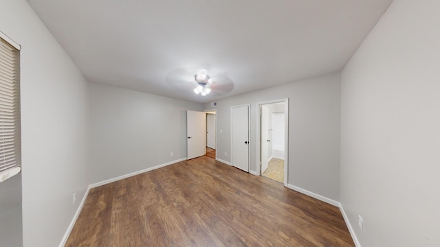 900 Mountain Creek Rd Unit G87, Chattanooga, TN 37405 - unfurnished bedroom with ensuite bath, ceiling fan, baseboards, and wood finished floors