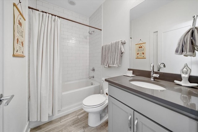 2123A 14th Ave N, Nashville, TN 37208 - bathroom featuring toilet, vanity, and shower / bath combo with shower curtain
