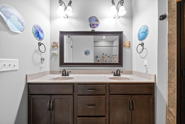 1438 Millet Dr, Clarksville, TN 37040 - full bathroom featuring double vanity and a shower