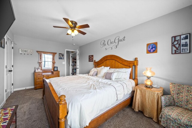 1438 Millet Dr, Clarksville, TN 37040 - bedroom featuring dark colored carpet, baseboards, and a ceiling fan