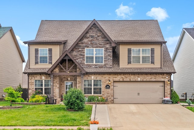 1438 Millet Dr, Clarksville, TN 37040 - view of front of house with concrete driveway, a front lawn, an attached garage, and roof with shingles