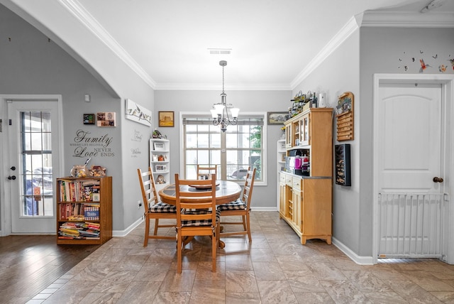 1438 Millet Dr, Clarksville, TN 37040 - dining area with healthy amount of natural light, crown molding, a chandelier, arched walkways, and baseboards