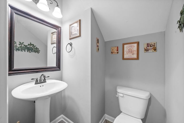 1438 Millet Dr, Clarksville, TN 37040 - half bath with toilet, lofted ceiling, and baseboards