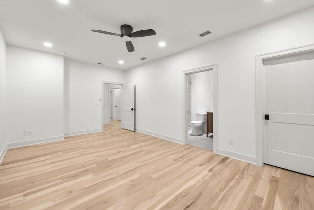 unfurnished bedroom with recessed lighting, visible vents, light wood finished floors, and ensuite bathroom