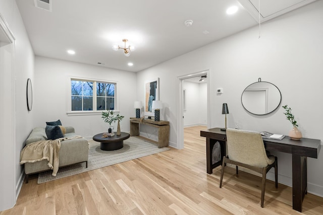 living room with light wood finished floors, attic access, baseboards, recessed lighting, and visible vents