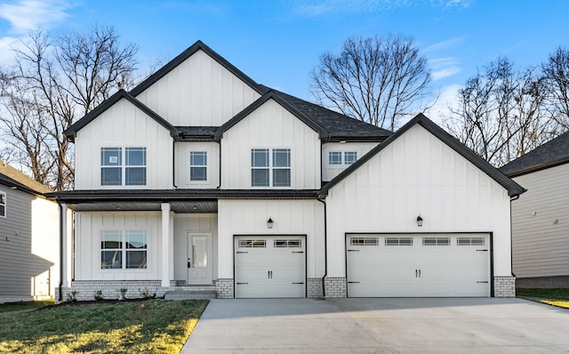 998 Alton Dr, Clarksville, TN 37043 - modern farmhouse style home with board and batten siding, an attached garage, driveway, covered porch, and a front yard