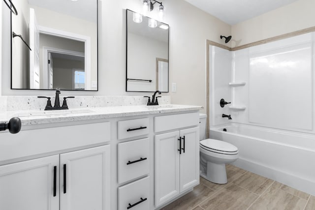 998 Alton Dr, Clarksville, TN 37043 - bathroom with bathtub / shower combination, a sink, double vanity, and toilet