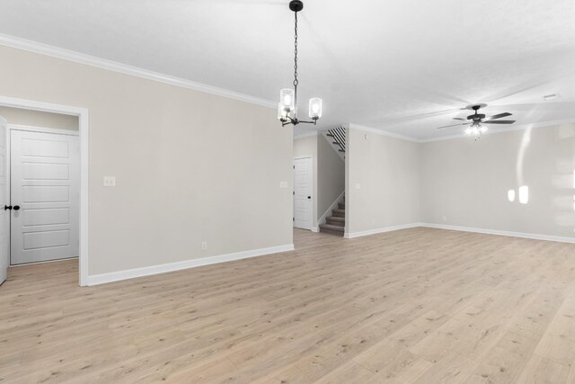 998 Alton Dr, Clarksville, TN 37043 - interior space with stairway, baseboards, ornamental molding, and light wood finished floors