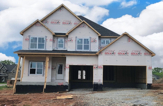 998 Alton Dr, Clarksville, TN 37043 - unfinished property featuring driveway, roof with shingles, and stucco siding