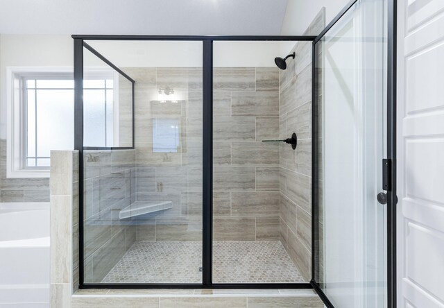 998 Alton Dr, Clarksville, TN 37043 - bathroom with a bath and a shower stall