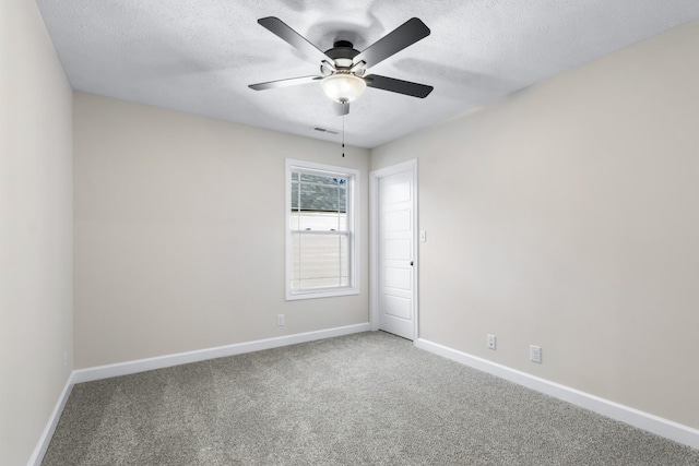 998 Alton Dr, Clarksville, TN 37043 - empty room featuring visible vents, a ceiling fan, carpet floors, baseboards, and a textured ceiling