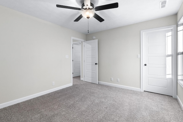 998 Alton Dr, Clarksville, TN 37043 - unfurnished bedroom with visible vents, carpet flooring, baseboards, and ceiling fan