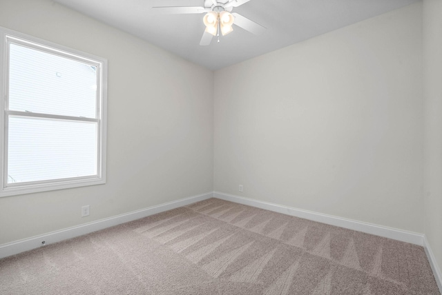 484 Herman Dr, Clarksville, TN 37042 - spare room with ceiling fan, light carpet, and baseboards