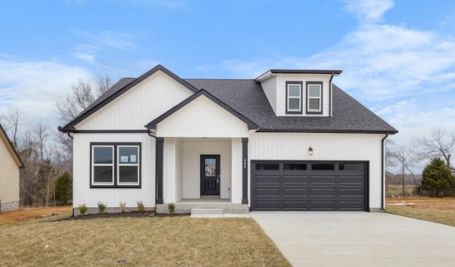 484 Herman Dr, Clarksville, TN 37042 - modern farmhouse featuring driveway, covered porch, roof with shingles, a front yard, and a garage