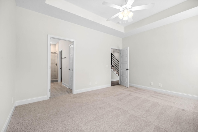 484 Herman Dr, Clarksville, TN 37042 - empty room with light carpet, baseboards, a raised ceiling, and ceiling fan