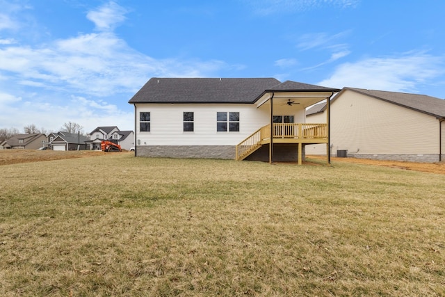 484 Herman Dr, Clarksville, TN 37042 - rear view of house with central AC, stairway, a yard, and ceiling fan