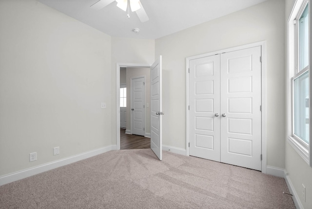 484 Herman Dr, Clarksville, TN 37042 - unfurnished bedroom featuring baseboards, carpet, and multiple windows
