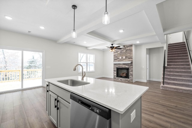 484 Herman Dr, Clarksville, TN 37042 - kitchen with stainless steel dishwasher, dark wood-style floors, a sink, and ceiling fan