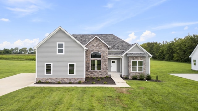 craftsman-style home with stone siding and a front lawn