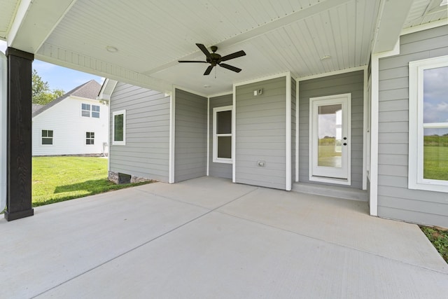 view of patio featuring a ceiling fan